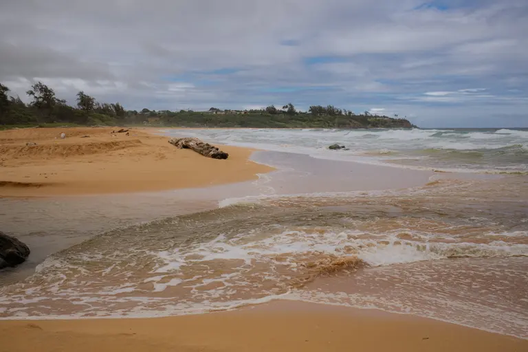 Surf across the sand